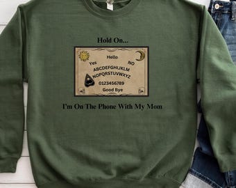 Ouija Talking Board Sweatshirt, Hold On, Im On The Phone With My Mom Crewneck Sweatshirt | Funny Spiritual Graphic Unisex Heavy Blend