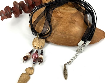 Bronze and Pearls Pendant on Black Cord Necklace