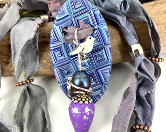 Three Silk and beaded necklace with handmade focal pendant