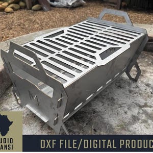 Puede incluir: Un hogar de fuego de metal con una rejilla de parrilla. El hogar de fuego está hecho de acero y tiene una forma rectangular. La rejilla de parrilla está hecha de metal y tiene una forma rectangular. El hogar de fuego está sentado en una superficie de concreto. El texto "DXF FILE/DIGITAL PRODUCT" es visible en la imagen.