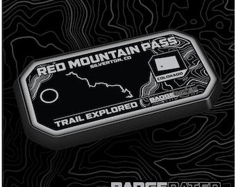 May include: Black and white badge-shaped patch with the text "Red Mountain Pass" and "Silverton, CO". The patch also features a map of the trail, a small Colorado state flag, and the text "Trail Explored" and "BadgedRated.com".