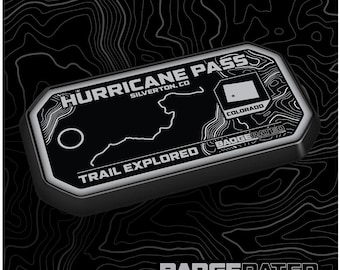 May include: A black and white trail badge with the text "HURRICANE PASS SILVERTON, CO" and "TRAIL EXPLORED" with a map of the trail and the state of Colorado. The badge is made by BADGERATED.