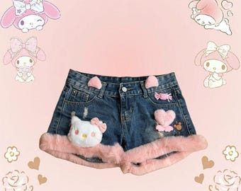 Pink denim shorts with faux fur trim, featuring a cute kawaii design