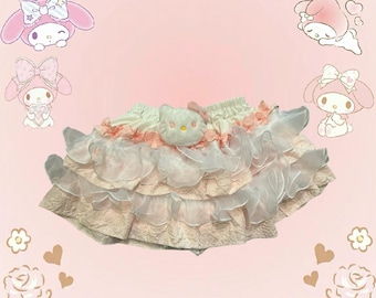 Pink and cream ruffle skirt with a touch of whimsy
