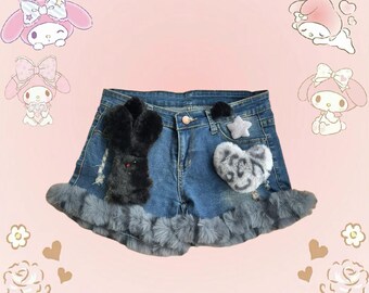 Cute denim shorts with faux fur trim and heart patches