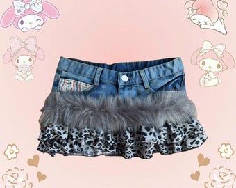 Mini denim skirt with faux fur and studs