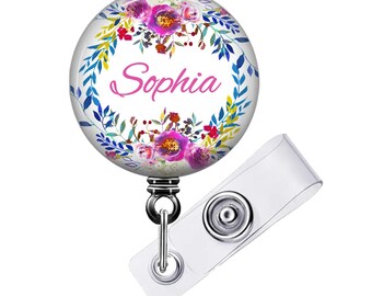 Porta credencial retráctil con diseño floral rosa