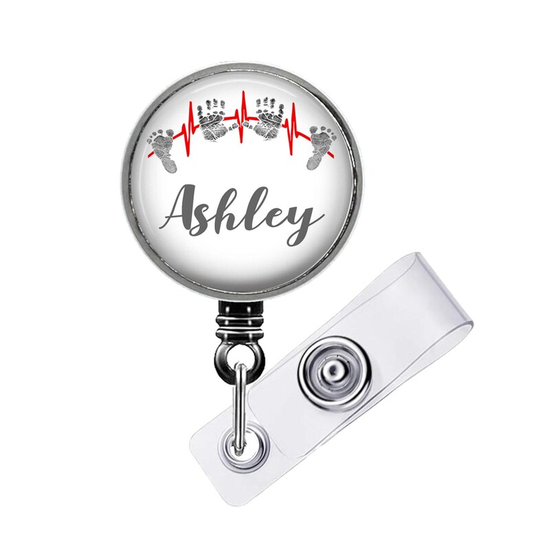 Retractable badge reel with design size choice 1¼ inch Plain extends to 34 inches