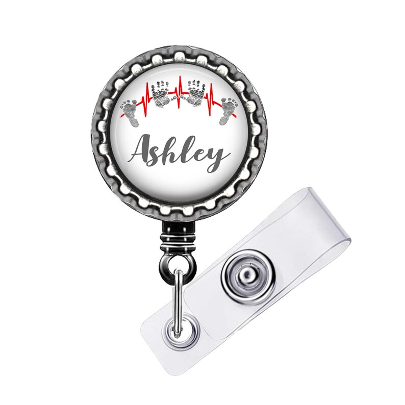 Retractable badge reel with design size choice 1 inch Cap extends to 34 inches