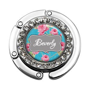 Individueller faltbarer Taschenhaken mit rosa Blume - Damen Taschenaufhänger für TableDesk - mit Monogramm Name - Hochzeitsbevorzugung Geschenk 077