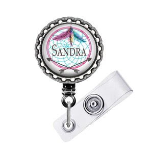 Retractable badge reel with design size choice 1 inch Cap extends to 34 inches
