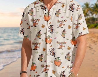 May include: A short-sleeved button-down shirt in a light cream color featuring an all-over print of cartoon mice dressed in Halloween costumes, including mice in orange pumpkins, mice wearing witch hats, and small ghost and skull icons.
