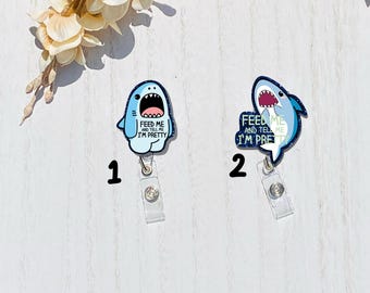 Feed Me and Tell me I’m pretty shark Badge reel