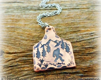 1" Tall Rustic Sasquatch- Bigfoot Mountain Scene Copper Cow Tag Necklace-  Hand Stamped/Tooled- Sealed-  18" Stainless Chain Necklace-