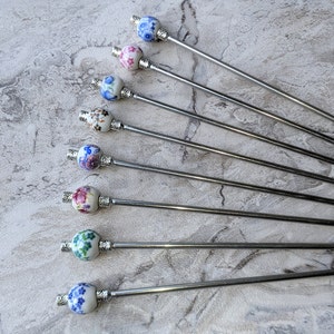 Round Floral Porcelain and Steel Hair Stick