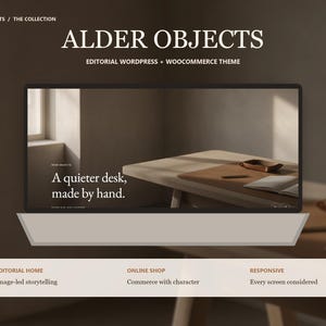 Puede incluir: Una pantalla digital del tema editorial de WordPress y WooCommerce Alder Objects. La pantalla muestra una escena de escritorio con el texto A quieter desk, made by hand. Debajo, un men&uacute; enumera Editorial Home, Online Shop y Responsive.
