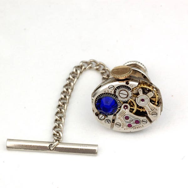 Tie Time - Steampunk Tie Tack With Bar And Chain - Complete Vintage Oval Repurposed Watch Movement Tie Tack With Cobalt Blue Crystal