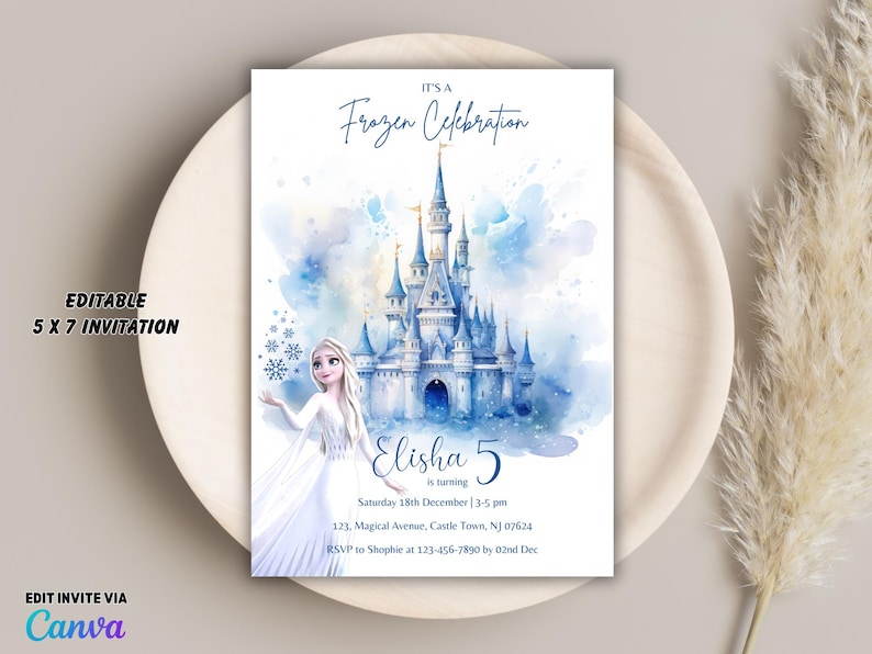May include: A 5 x 7 inch invitation with a Frozen theme. The invitation features a watercolor illustration of a castle and a character from the movie. The text reads "It's a Frozen Celebration" and includes party details.