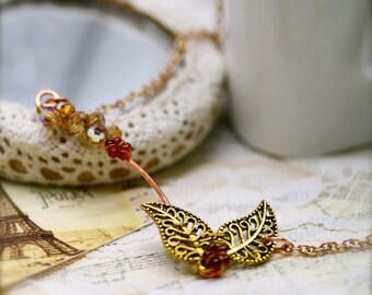 Eden golden leaves with glass crystals necklace