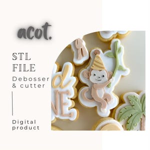 May include: Cookies decorated with white icing, featuring a monkey wearing a party hat, a palm tree, and the words "one". The image also includes the text "STL FILE Debosser & cutter Digital product".
