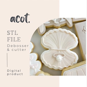 May include: Decorated cookies, including a seashell-shaped cookie with a pearl, and other cookies with white and light pink icing. The image includes the text "acot." and "STL FILE Debosser & cutter Digital product".