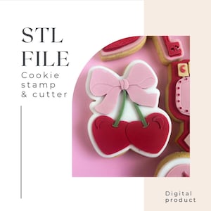 Puede incluir: Archivo STL Cookie stamp & cutter, una descarga digital para crear galletas con forma de cereza con un lazo rosa en la parte superior.
