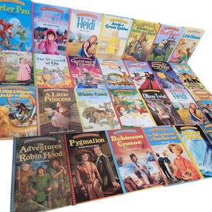 May include: A collection of 28 classic children's books, including Peter Pan, Heidi, The Wizard of Oz, and Robinson Crusoe. The books are arranged in a staggered pattern, with the spines facing the viewer. The books are all in the same style, with colorful covers and illustrations.