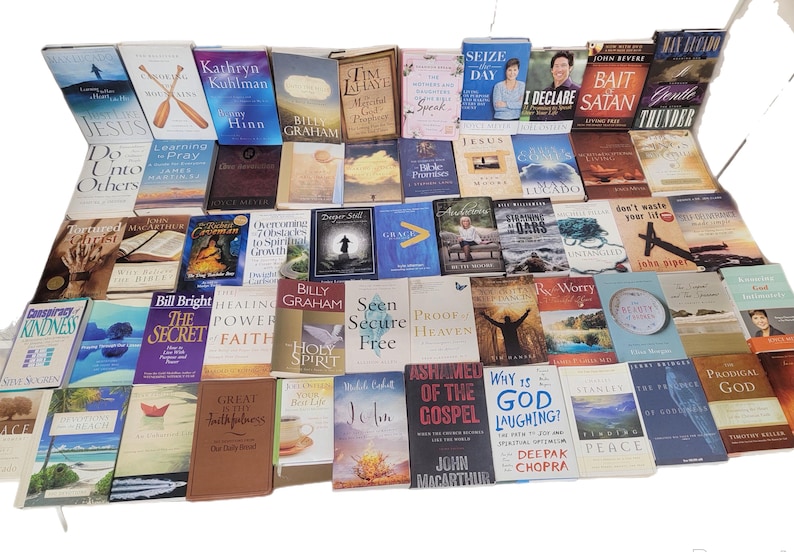 May include: A large collection of books with religious themes, including titles such as "Jesus Do Unto Others", "Learning to Pray", "The Secret", "Healing Power Faith", "Holy Spirit", "Seen Secure Free", "Proof of Heaven", "Ashamed of the Gospel", "Why is God Laughing", "Gentle Thunder", "Bait Satan", "I Declare", "Don't Waste Your Life", "The Prodigal God", and "Great is Thy Faithfulness".