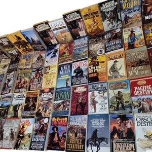 May include: A large collection of paperback books, mostly western novels, with titles like "Backfire", "The Last Ride of Red Strange", "Trouble Shooter", and "Wildfire".