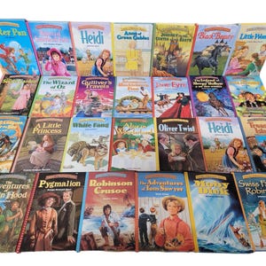 May include: A collection of 28 classic children's books with colourful covers featuring illustrations of characters from the stories. The books include titles like "Peter Pan", "Heidi", "Anne of Green Gables", "The Wizard of Oz", "Gulliver's Travels", "Treasure Island", and "Robinson Crusoe".