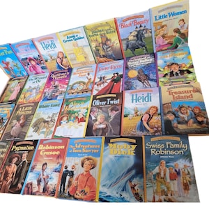 May include: A collection of 28 paperback books with colourful covers featuring titles such as "Peter Pan", "Heidi", "Anne of Green Gables", "Black Beauty", "Little Women", "The Wizard of Oz", "Gulliver's Travels", "Jane Eyre", "Oliver Twist", "Treasure Island", "Robinson Crusoe", "The Adventures of Tom Sawyer", "Moby Dick", and "Swiss Family Robinson".