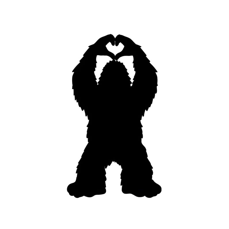 May include: Black silhouette of a furry creature making a heart shape with its hands.