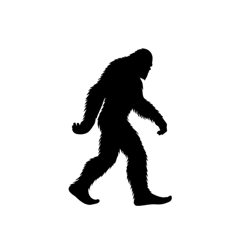 May include: Black silhouette of a Bigfoot walking to the right.