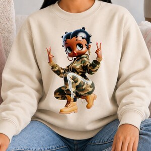 Black Crewneck Sweatshirt Betty Boop Character Graphic Design Vintage Style Pullover Retro Fashion Statement Cotton Apparel Comfort Casual Wear Daily Outfit Essential Fan Collectible Item Gift Idea Classic Cartoon Merchandise Iconic