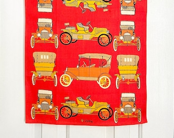 Vera Neumann linen tea towel antique automobiles cars, red and orange print, wall hanging for classic auto collectors, vintage kitchen