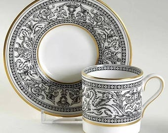 Wedgwood Florentine demitasse cup and saucer in black with gold trim, mystical creatures dragons, hand enameling, plain center on saucer