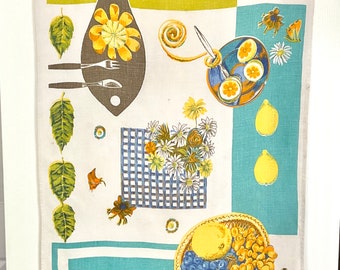 Irish linen tea towel from Poland with fruits and flowers, yellow aqua and blue warm summer colors, lemons grapes, fun mid century graphics