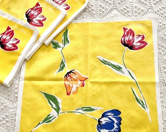 10 yellow floral napkins by Bill Blass with large tulip blossoms, in blue red orange, vintage table linens, casual farmhouse style, signed