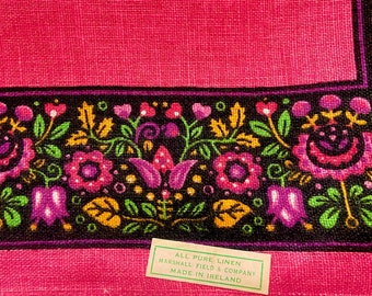 Raspberry Irish linen tea towel solid color center, black border with stylized flowers, never used, new with tag,by Webbs for Marshall Field