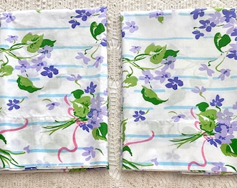 2 king pillowcases Violet Blue in Mixed Bouquet pattern, Stevens Utica, African violets floral print, blue stripes, 1970s vintage bedding