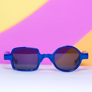 Retro Blau schrullig Sonnenbrillen | Die Unentschlossenheit