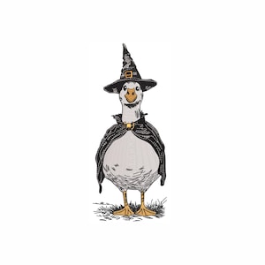 May include: An embroidered illustration of a goose dressed as a witch. The goose wears a black witch hat with a gold buckle, a black cape, and a gold clasp. The goose stands on a patch of grass, with a white background.
