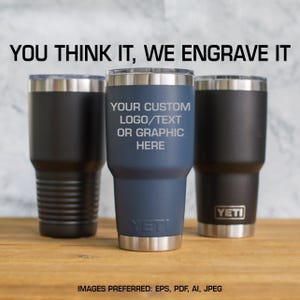 May include: Three insulated tumblers in black and navy blue with silver rims and bases. The center tumbler has the text "YOUR CUSTOM LOGO/TEXT OR GRAPHIC HERE". The text "YOU THINK IT, WE ENGRAVE IT" is above the tumblers.