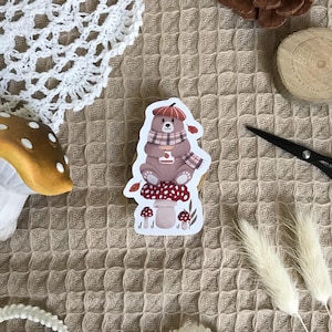 Autocollant ours mignon sur champignon, ours tenant un pot de confiture, autocollant automne
