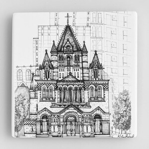 May include: Black and white line drawing of a church building with a tall steeple and intricate details. The church is surrounded by other buildings and trees.