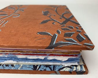 blue-brown nouveau journal with thick mixed-media paper