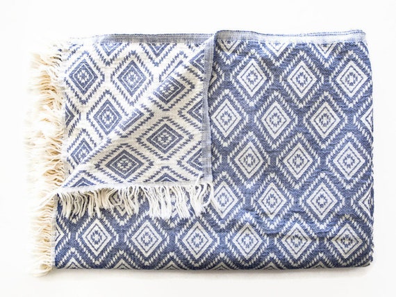 blue and white throws for beds