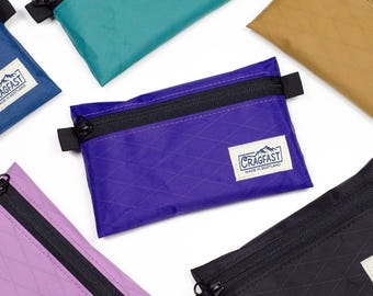 Duża, ultralekka saszetka zapinana na zamek / portfel szlakowy