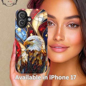 May include: A smartphone case featuring a stained-glass style design of an American bald eagle against a backdrop of the American flag. The case has a black border and the text "Available in iPhone 17".