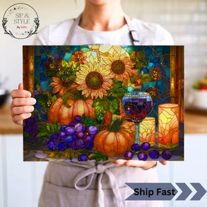 May include: A rectangular artwork with a stained-glass effect, showing sunflowers, pumpkins, grapes, and a wine glass. The artwork includes the text "Sip & Style" and "Ship Fast". The colour palette is autumnal.